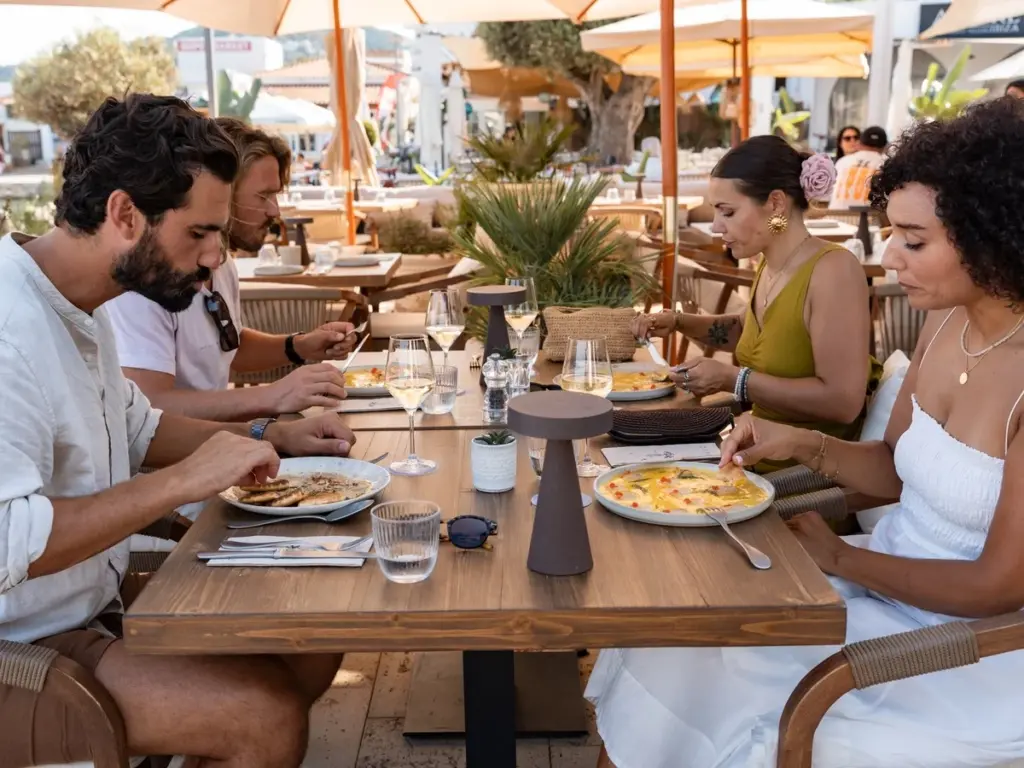 Enjoying gourmet dishes at the food and wine tour from Food Tours Balearics at restaurant Voraz