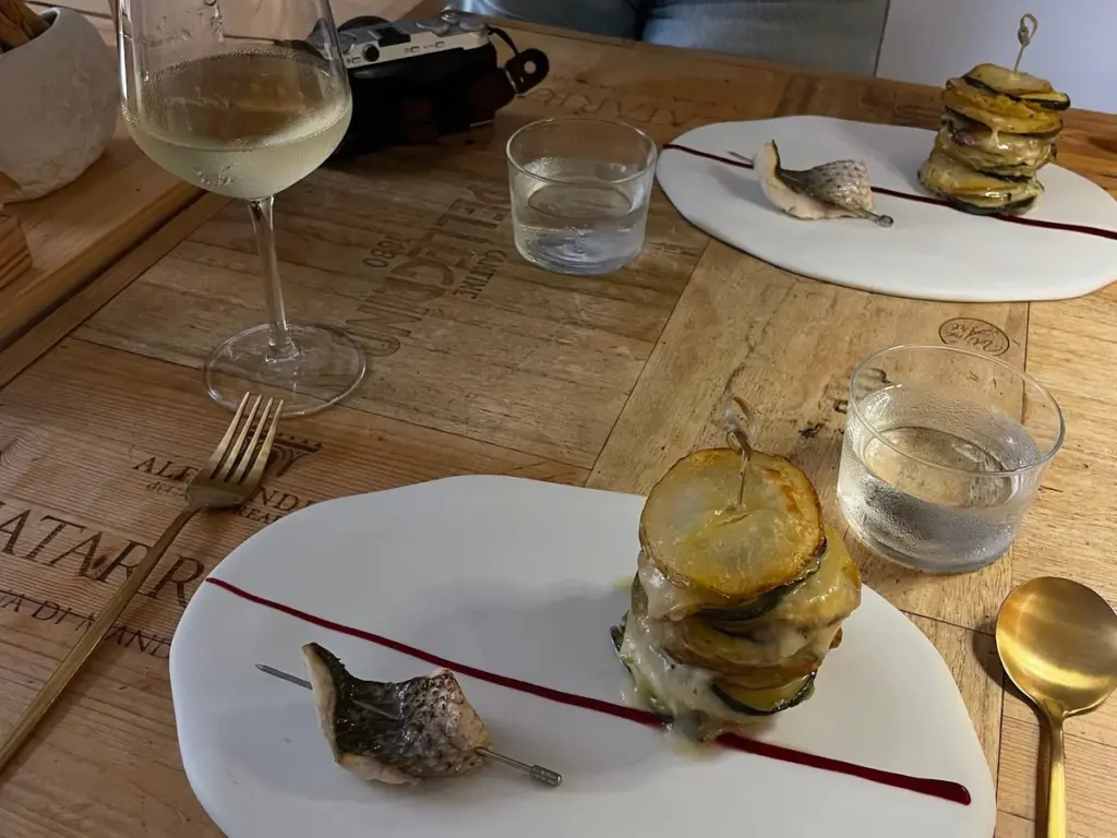 Wine and dine food tour in Palma Old Town with signature dishes paired with wine at Pomelia restaurant