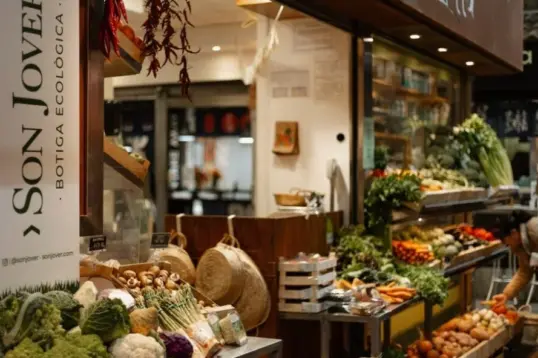Local food market in Mallorca with seasonal produce, artisanal stalls and locals shopping