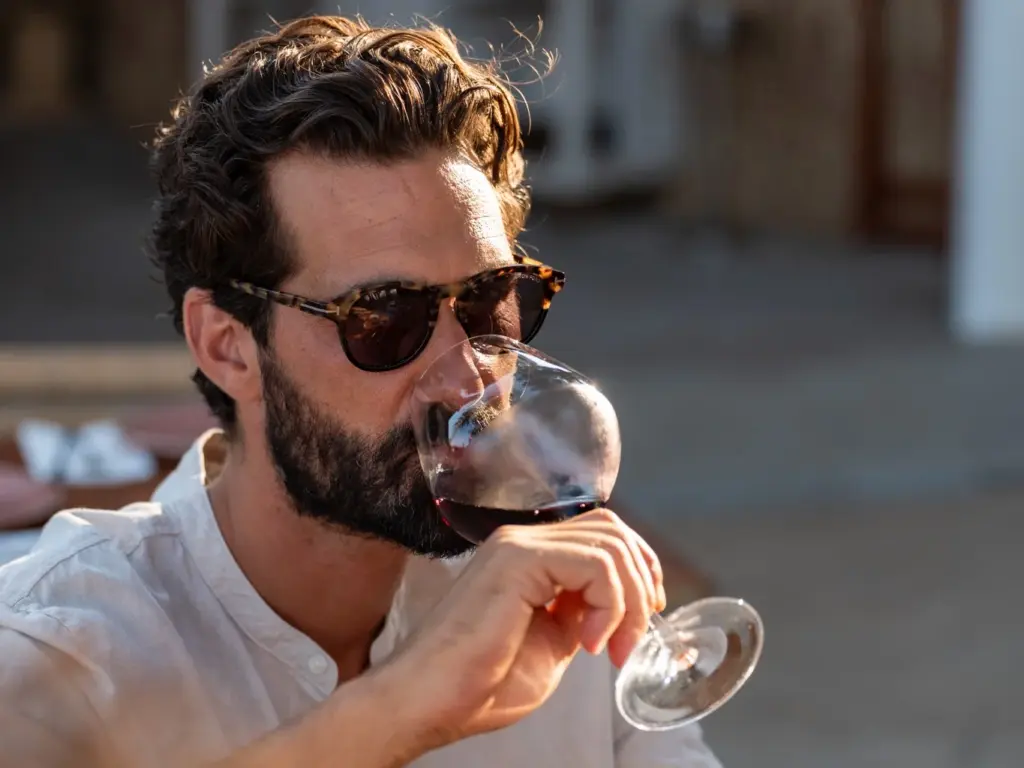 Enjoying a glass of wine during the best food tours in Ibiza Town